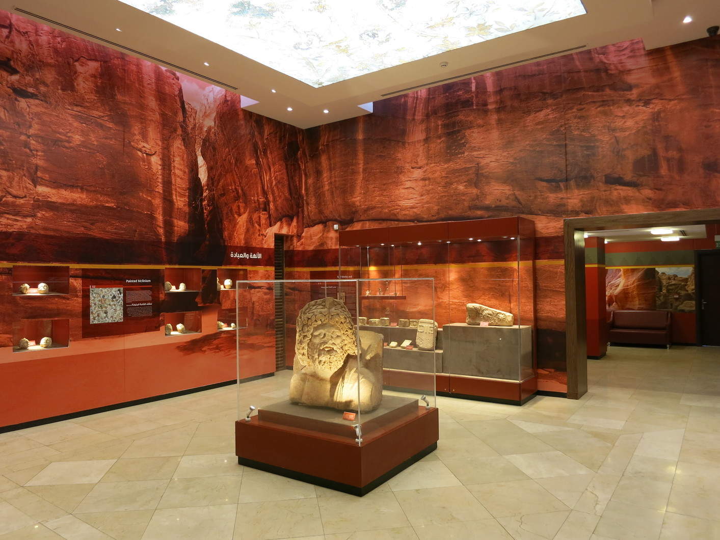This room from the new Petra visitors' center exhibition showcases artifacts that shed light on Nabataean religion and cult. Photo by Glenn J. Corbett.