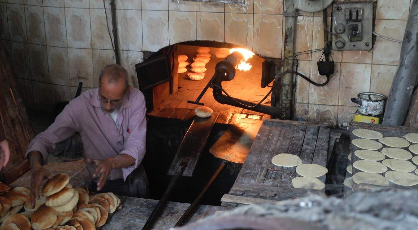 Subsidized bread like the loaves produced by this bakery in the Jabal al-Nadhif neighborhood of Amman is a critical staple for many Jordanians, who consume an estimated ten million loaves every day.