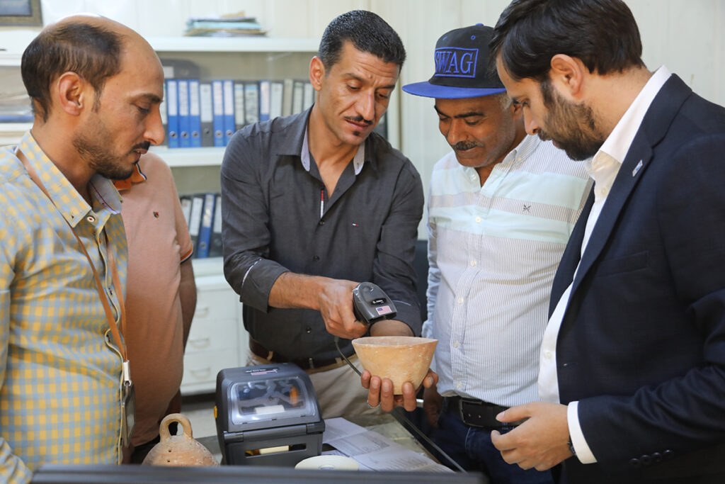 Trainees of the Prevention of Illicit Trafficking of Cultural Property Project learning how to use barcodes and QR codes to track artifacts.