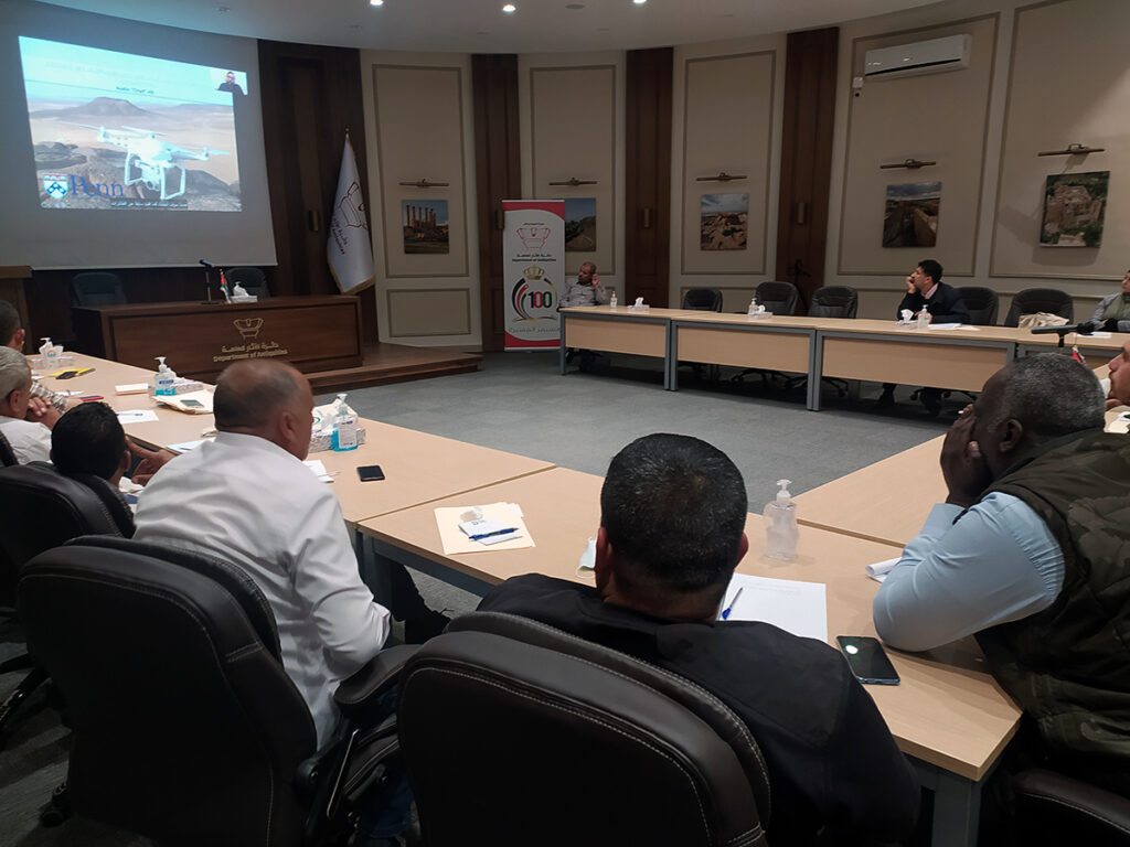 Trainees of the Prevention of Illicit Trafficking of Cultural Property Project watch a recorded lecture in English with Arabic subtitles in Amman.