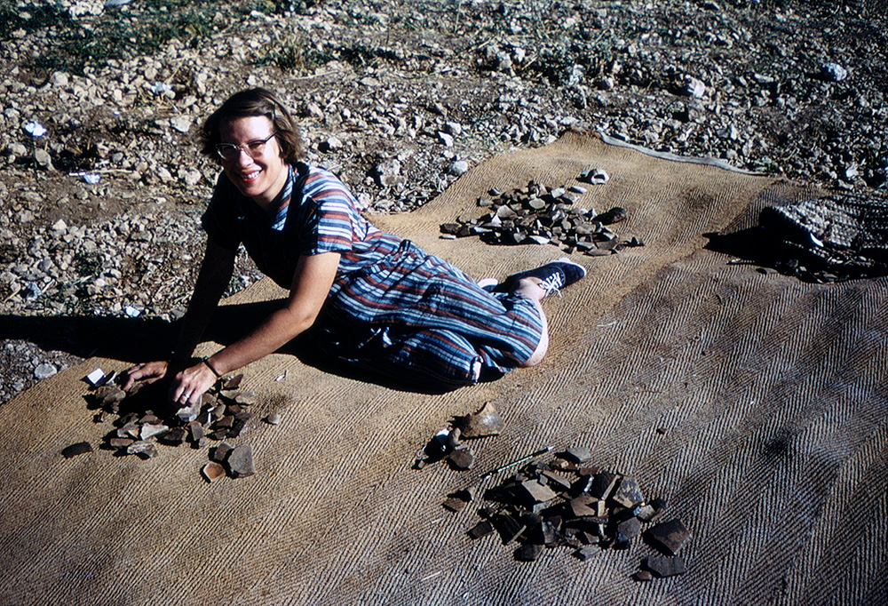 Nancy Lapp sorting pottery at Iraq al-Amir, Jordan, September 1962